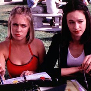 MELISSA JOAN HART (left) as Nicole casts a wary eye on her cynical friend Alicia, played by SUSAN MAY PRATT. photo 5