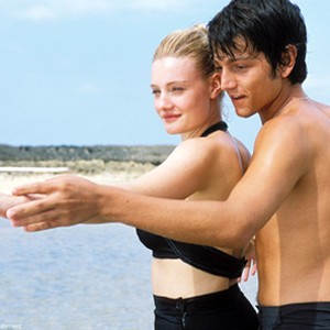 Katey (Romola Garai) and Javier (Diego Luna) practice their moves on the beach in Dirty Dancing: Havana Nights. photo 5