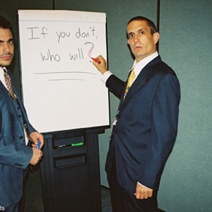 "MIKE" and "ANDY" impersonate members of the World Trade Organization in United Artists' documentary THE YES MEN. photo 15