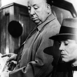 THE WRONG MAN, from left: director Alfred Hitchcock, Henry Fonda on set, 1956 thewrongman1956-fsct01(thewrongman1956-fsct01)