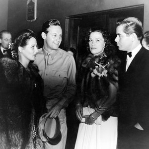 From left: Brenda Marshall, William Holden, Eleanor Powell, Glenn Ford, attending the benefit premiere of THE TALK OF THE TOWN, 1942