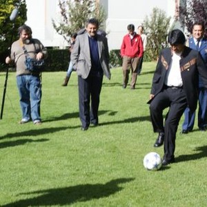SOUTH OF THE BORDER, director Oliver Stone (left), Evo Morales (with ball), 2009. ph: Jose Ibanez/©Cinema Libre Studio