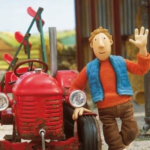 I want a big red tractor in a cartoon