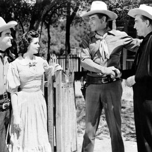 LAW OF THE PANHANDLE, from left: Riley Hill, Jane Adams, Johnny Mack Brown, Ted Adams, 1950