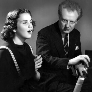 ONE HUNDRED MEN AND A GIRL, Deanna Durbin and Leopold Stokowski rehearsing an aria, 1937