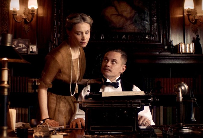 man, woman, and typewriter in Coup!