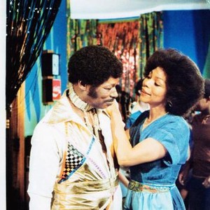 THE MONKEY HUSTLE, from left: Rudy Ray Moore, Rosalind Cash, 1976