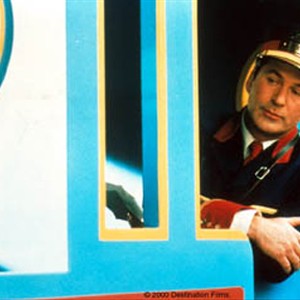 Mr. Conductor (Alec Baldwin) is "All Aboard!" in Thomas and the Magic Railroad. photo 15