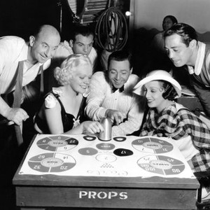 MUSIC IS MAGIC, from left: Andrew Tombes, Frank Mitchell (back), Alice Faye, Ray Walker, Bebe Daniels, Jack Durant, playing a board game between scenes, on set, 1935. ©20th Century-Fox Film Corporation, TM & Copyright,