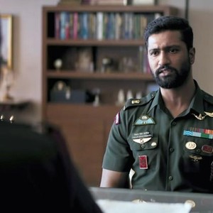 URI: THE SURGICAL STRIKE, FROM LEFT: PARESH RAWAL (BACK TO CAMERA), VICKY KAUSHAL, 2019. © ZEE STUDIOS