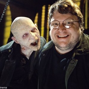 Director Guillermo del toro (right) with a Reaper on the set of New Line Cinema's action thriller, BLADE II.