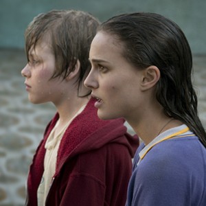Devin Brochu as T.J. and Natalie Portman as Nicole in "Hesher."