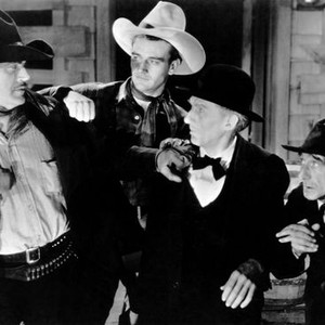 HAUNTED GOLD, from left, Harry Woods, John Wayne, Erville Alderson,  Otto Hoffman, 1932