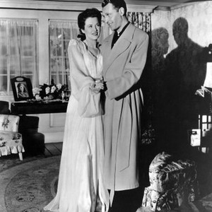 GUEST IN THE HOUSE, from left: Ruth Warrick, Ralph Bellamy, 1944