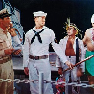MISTER ROBERTS, Henry Fonda (left), Ken Curtis (sailor uniform), Jack Lemmon (second from right), 1955.
