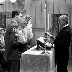 DESPERATE, kissing from left: Steve Brodie, Audrey Long, Hans Herbert (behind podium), 1947