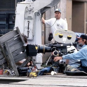 ASSASSINS, cinematographer Vilmos Zsigmond behind camera on set, 1995