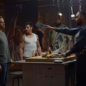(L-R) Paul Walker as Damien, David Belle as Lino, Kwasi Songui as Big Cecil and RZA as Tremaine in "Brick Mansions." photo 5