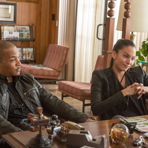 Tip "T.I." Harris as Julian and Genesis Rodriguez as Marisol in "Identity Thief." photo 5