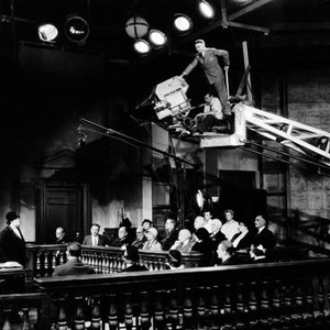 EMMA, Purnell Pratt, Marie Dressler, director Clarence Brown (standing on crane) filming on set, 1932