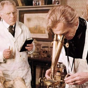 THE CREEPING FLESH, from left: George Benson, Peter Cushing, 1973