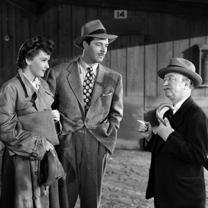 SHE WENT TO THE RACES, from left: Frances Gifford, James Craig, Frank Orth, 1945