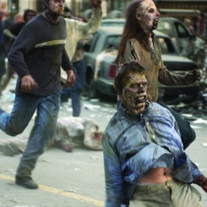 A pursuing zombie goes from undead to dead in the zombie action thriller, Dawn of the Dead.