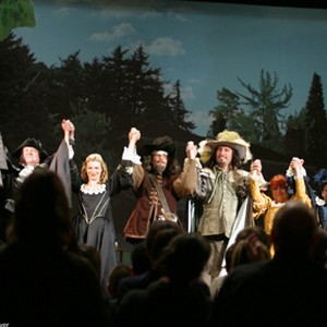 Grace (AMY SMART, center left), Peter (MARCUS THOMAS, center), Michael (JOHN CORBETT, center right), and the rest of the cast take their bows after a performance of "Cyrano" in BIGGER THAN THE SKY. photo 12