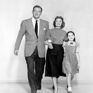 TROUBLE ALONG THE WAY, from left: John Wayne, Donna Reed, Sherry Jackson, 1953