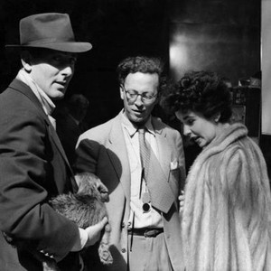 THE TITFIELD THUNDERBOLT, Michael Wilding, Elizabeth Taylor, visit cinematographer Douglas Slocombe, (center) on-set, 1953