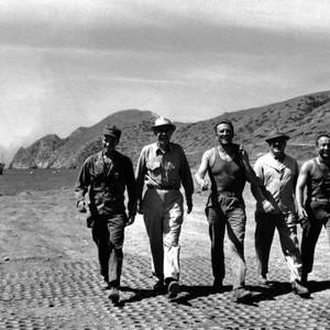 THE HOOK, strolling on location are, from left, Robert Walker, Jr., director George Seaton, Kirk Douglas, producer William Perlberg, Nick Adams, 1963