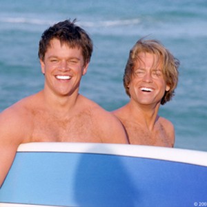 Conjoined twins Bob and Walt Tenor (Matt Damon, Greg Kinnear) prepare to ride the waves. photo 17