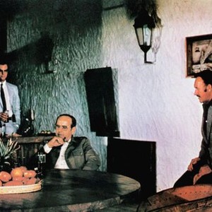 THE DOMINO PRINCIPLE, seated from left: Richard Widmark, eli Wallach, Gene Hackman, Edward Albert (standing rear), Candice Bergen (standing extreme right), 1977