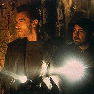 Arnold Schwarzenegger and Kevin Pollak in Universal's End Of Days