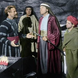 THIEF OF DAMASCUS, from left, Philip Van Zandt, Lon Chaney, Jr., Paul Henreid, Robert Clary, 1952