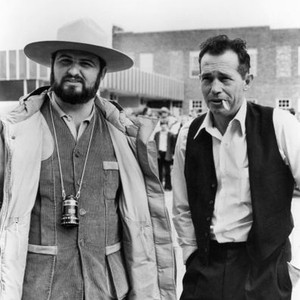 DILLINGER, from left: writer-director John Milius, Warren Oates, on location in Oklahoma, 1973