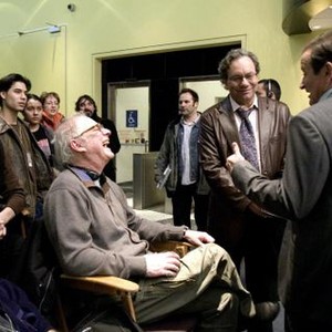 MAN OF THE YEAR, Director Barry Levinson (sitting), Lewis Black (facing camera), Robin Williams (extreme right), 2006, ©Universal