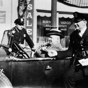 MAN ON THE FLYING TRAPEZE, W.C. Fields (in car), Edward Gargan (right), 1935