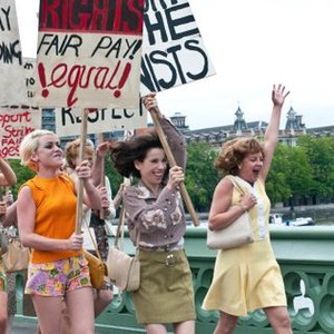 MADE IN DAGENHAM, women carrying signs, from left: Andrea Riseborough, Jaime Winstone, Sally Hawkins, 2010. ph: Susie Allnut/©Sony Pictures Classics