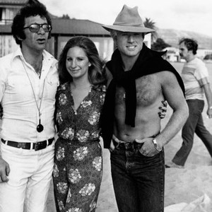 THE WAY WE WERE, from left: director Sydney Pollack, Barbra Streisand, Robert Redford on set, 1973
