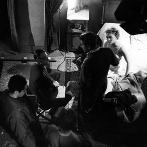 DEADLIER THAN THE MALE, (aka VOICI LE TEMPS DES ASSASSINS), director Julien Duvivier, (seated), Jean Gabin, Daniele Delorme, on-set, 1956