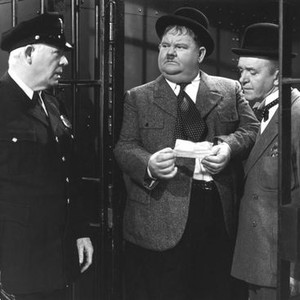NOTHING BUT TROUBLE, Cliff Clark, Oliver Hardy, Stan Laurel (Laurel and Hardy), 1944