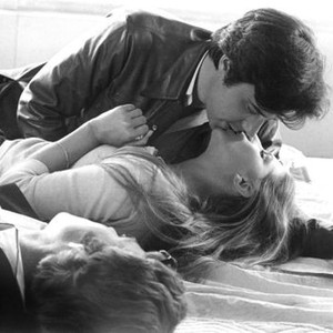 WHAT'S UP, DOC?, director Peter Bogdanovich on set demonstrating kissing scene with Barbra Streisand and Ryan O'Neal, 1972