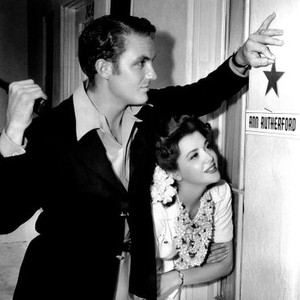 BADLANDS OF DAKOTA, Robert Stack, nailing a star to costar Ann Rutherford's dressing-room door, 1941