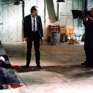RESERVOIR DOGS, Tim Roth, (far left), Steve Buscemi (center), filming scene, 1992. ©Miramax
