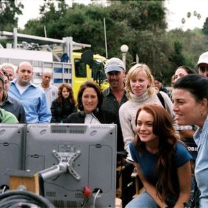 HERBIE: FULLY LOADED, director Angela Robinson, Lindsay Lohan and crew watching playback on set, 2005, (c) Walt Disney