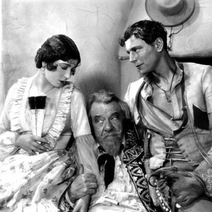 TIDE OF EMPIRE, left: Renee Adoree, far right: William Collier Jr., 1929