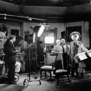 ANOTHER LANGUAGE, director Edward H. Griffith (standing at camera) with from left: Louise Closser Hale, Henry Travers, Robert Montgomery, Helen Hayes on set, 1933