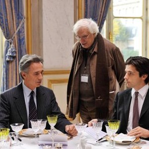 THE FRENCH MINISTER, (aka QUAI D'ORSAY), from left: Thierry Lhermitte, director Bertrand Tavernier, Raphael Personnaz, on set, 2013. ©IFC