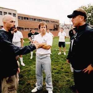 INVINCIBLE, Director Ericson Core (left), Greg Kinnear (center), on set, 2006. ©Walt Disney Co.
